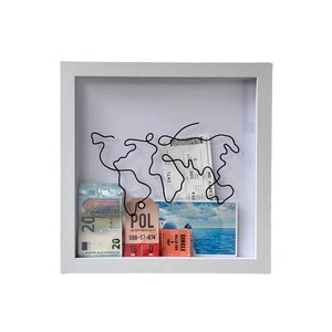 White shadow box frame with world map wire and travel souvenirs like tickets and cash