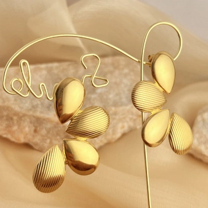 French vintage gold striped flower earrings with linear metal petals on silk fabric