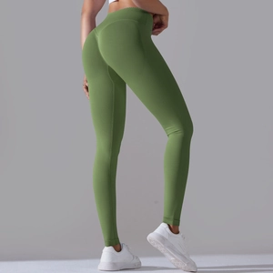 Close-up of the seamless peach lift design and olive green fabric on athletic leggings