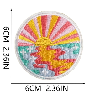 Close-up of 6cm round colorful sunset embroidery patch with vibrant stitching details