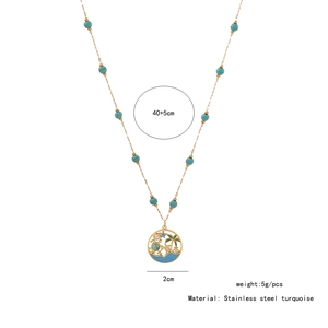 Close-up of stainless steel turquoise palm tree pendant with size and weight specs