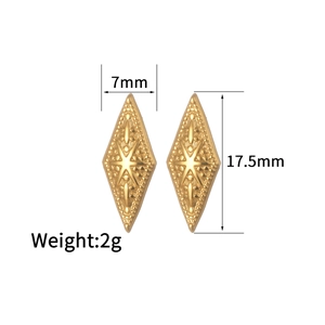 Macro shot of gold geometric rhombus earrings with star engraving and size dimensions
