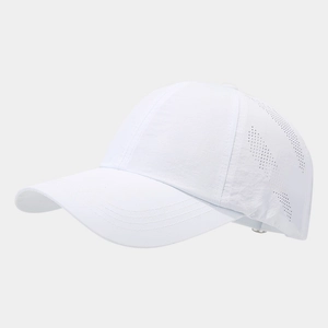 Detail of white baseball cap showing laser-cut ventilation holes and quick-dry fabric
