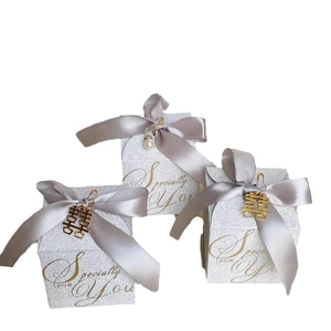 European silver glitter wedding favor boxes with grey ribbons and pearl pendants