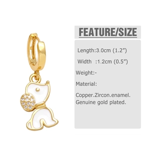 Detail view of cute dog dangle earrings with white enamel and sparkling zircon accents