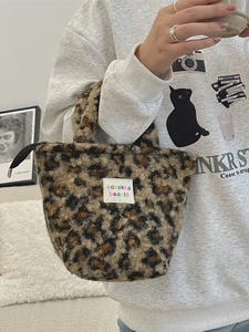 Chic leopard print plush handbag with soft faux fur and zip closure for women