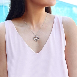 S925 sterling silver heart infinity necklace with zircon stones on female model