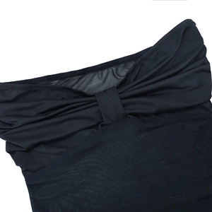 Close-up of black strapless bandeau dress featuring mesh stitching and ruched chest detail