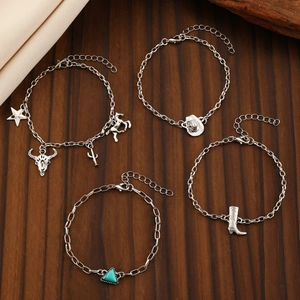 Set of 4 vintage silver bohemian bracelets with western cowboy boot and bull head charms