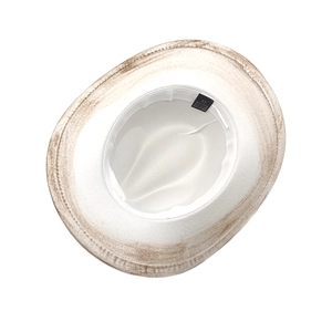 Close-up of ivory fedora interior showing the size 57 label and woven sweatband