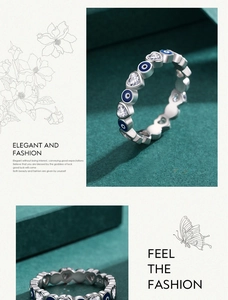 Detail shot of S925 silver ring featuring blue evil eye and heart cubic zirconia stones