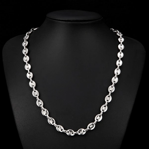 Polished silver stainless steel coffee bean chain necklace displayed on a black neck model