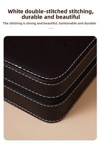 Macro shot of durable white double stitching on black lychee grain leather watch box