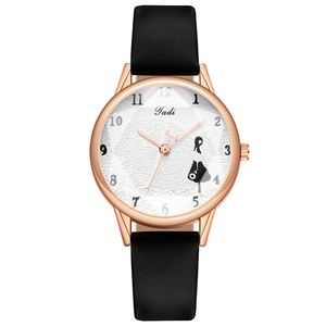 Women's minimalist watch with rose gold case, leather strap, and artistic dial