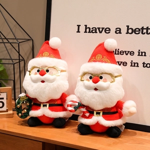 Peluches de Père Noël avec couronne et sucre d'orge pour la décoration de Noël à la maison