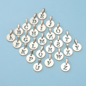 Set of 26 alphabet A-Z round hollow mirror stainless steel pendants on blue background