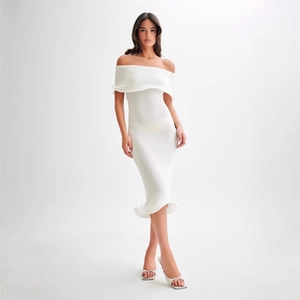 Close-up of elegant off-the-shoulder slim fit white midi dress with ruffle hem detail