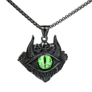 Gothic punk black metal necklace featuring evil green eye and skull wing pendant