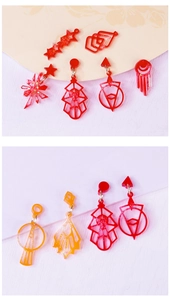 Detail of red and orange geometric resin earrings made with DIY silicone earring molds