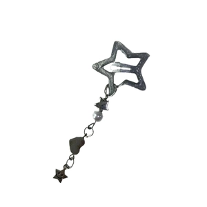 Silver star hair clip with dangling chains, faux pearls and heart charms on white background