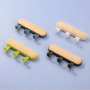 Japanese style wall hooks in four colors with 3 hangers on wood grain boards
