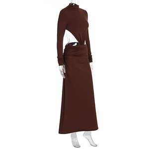 Detail view of waist cutout and ruched texture on a dark brown long sleeve dress