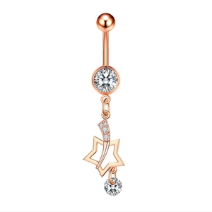 Detailed view of rose gold navel ring featuring zircon studs and a hollow star pendant