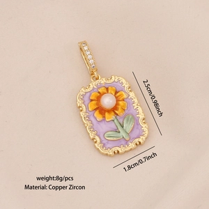 Macro detail of French vintage purple sunflower pendant with enamel and gold plating