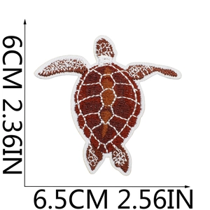 Detailed sea turtle embroidery patch in brown and white colors with size measurements