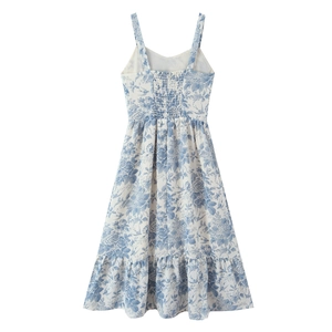 Detailed flat lay of French vintage floral slip midi dress in blue and white porcelain print