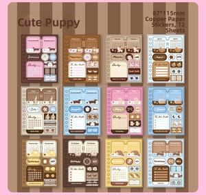 Detail view of 12 sets of dog-themed monthly planner stickers with calendars and checklists