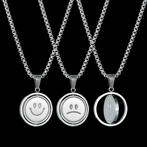 Rotating stainless steel smiley face pendant with a durable square box chain necklace