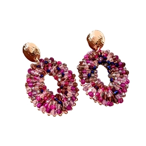 Handcrafted retro oval beaded drop earrings with gold hammered metal and purple glass beads