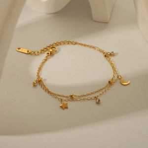 Double-layered 18K gold plated celestial bracelet with star and crescent moon pendants