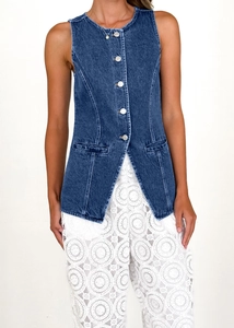 Detail of dark blue vintage wash denim vest with silver buttons and white lace pants