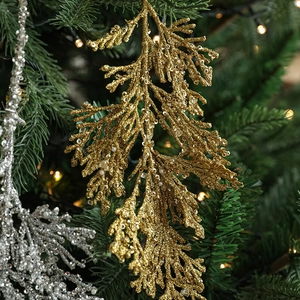 Glittering cypress leaf Christmas tree ornaments in gold and silver with sequins