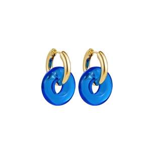 Detail of gold hoops with blue translucent resin rings showing polished metal texture