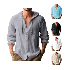 Detail view of linen texture on hooded shirt featuring button closure and drawstring