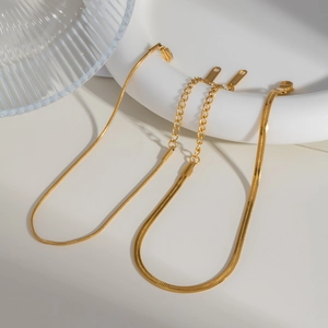 Detailed view of golden stainless steel flat snake chain and thin link anklets set