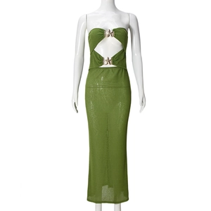Close-up of olive green strapless maxi dress with golden star hardware and knit texture