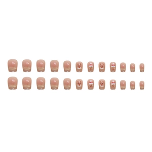 Christmas press-on nail kit with 24 nude pink pieces featuring Santa and reindeer designs