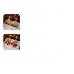 Detailed spec sheet showing material, size, and weight for vintage tassel earrings
