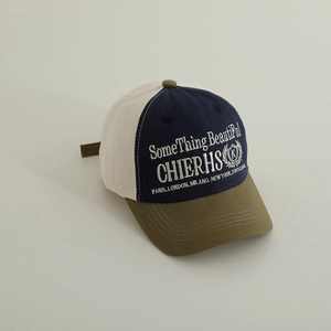 Three-color patchwork cotton baseball cap with white city embroidery and curved brim