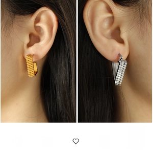Chunky U-shaped earrings with unique watchband chain texture in gold and silver finish