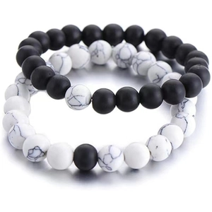 Detailed view of 8mm matte black onyx and white turquoise beaded bracelets set for couples