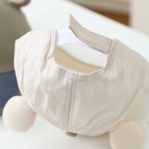Beige baby baseball cap with adjustable hook-and-loop strap and cute plush ears