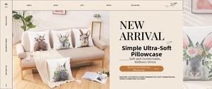 Detail of soft pillow cover featuring hand-drawn rabbit and floral prints on a sofa