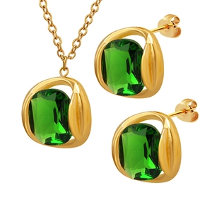 Vintage gold emerald crystal jewelry set including necklace pendant and stud earrings