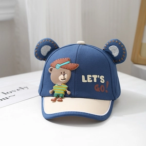 Detail of baby baseball cap with 3D cartoon bear, decorative ears and Let's Go text