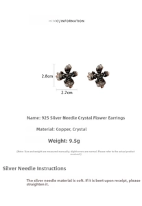 Détail de boucles d'oreilles fleurs en cristal, taille 2,8cm x 2,7cm, poids 9,5g